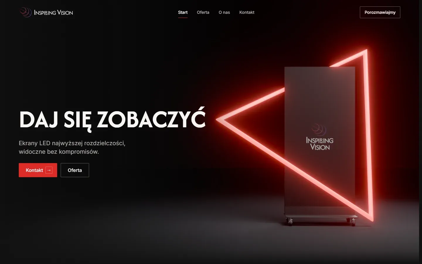 Strona inspiringvision.pl na komputerze - pierwszy ekran z hasłem Daj się zobaczyć i wizualizacją ekranu LED w neonowym trójkącie.
